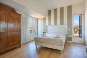 Posteľ alebo postele v izbe v ubytovaní Penthouse with big terrace in Oltrarno