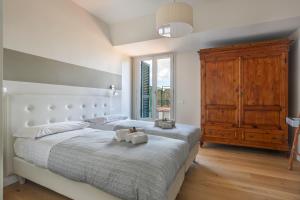 Posteľ alebo postele v izbe v ubytovaní Penthouse with big terrace in Oltrarno