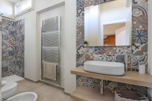 Kúpeľňa v ubytovaní Penthouse with big terrace in Oltrarno