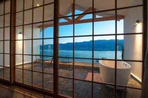 Bilik mandi di Chunshan Sea View Suite Hotel +59 gambar