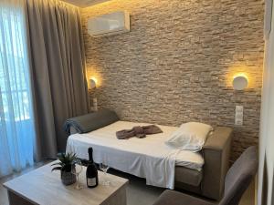 Postel nebo postele na pokoji v ubytování Jasmine Hotel & Apartments