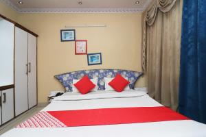 Super Hotel O Akash Regency客房内的一张或多张床位