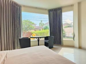 Postel nebo postele na pokoji v ubytování TY Holiday Resort + 286 fotografií