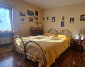 Postel nebo postele na pokoji v ubytování Casa Vacanze da NONNA ANNA