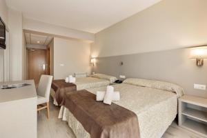 Postel nebo postele na pokoji v ubytování Hotel Best Cap Salou