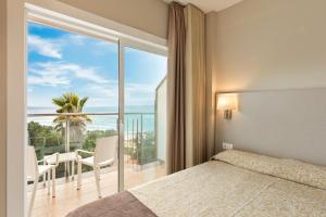 Postel nebo postele na pokoji v ubytování Hotel Best Cap Salou