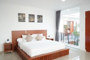 Katil atau katil-katil dalam bilik di Beach Manor in Bingin- Casa Boba +33 gambar