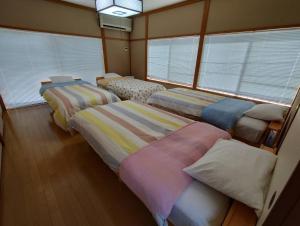 Voodi või voodid majutusasutuse ゆふ山荘 toas