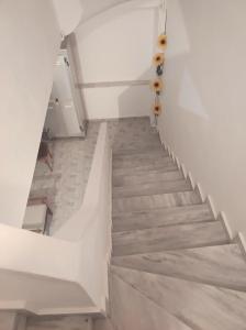 Giường trong phòng chung tại Two Palm Trees 1