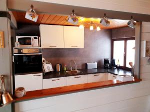 Kuchyň nebo kuchyňský kout v ubytování chalet 275