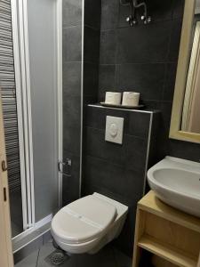Koupelna v ubytování Hotel Xanadu