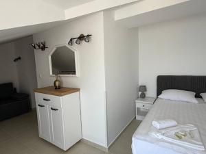 Postel nebo postele na pokoji v ubytování Hotel Xanadu