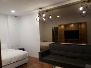 Postel nebo postele na pokoji v ubytování Kenting Dawan Homestay
