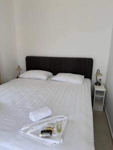 Postel nebo postele na pokoji v ubytování Hotel Xanadu