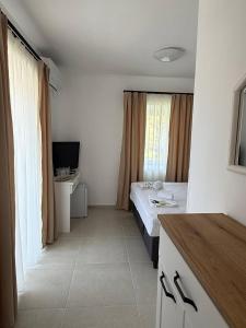 TV a/nebo společenská místnost v ubytování Hotel Xanadu