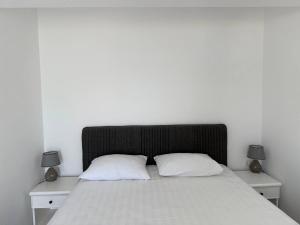 Postel nebo postele na pokoji v ubytování Hotel Xanadu