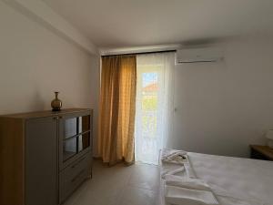 Postel nebo postele na pokoji v ubytování Hotel Xanadu