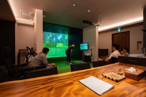 TV a/nebo společenská místnost v ubytování 箱根芦ノ湖ゴルフVilla + 59 fotografií