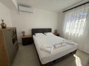 Postel nebo postele na pokoji v ubytování Hotel Xanadu
