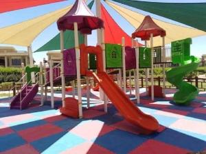 a childrens playground with slides and a slide at Elsokhna BlueBay Asia For families only in Ain Sokhna