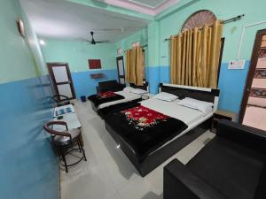 Postel nebo postele na pokoji v ubytování Hotel Welcome Nepal