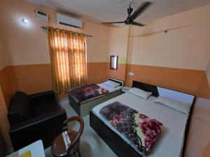 Postel nebo postele na pokoji v ubytování Hotel Welcome Nepal