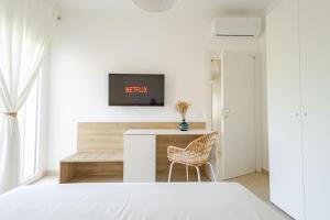 TV a/nebo společenská místnost v ubytování La Perla di Brucoli