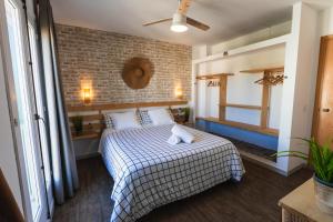 Postel nebo postele na pokoji v ubytování Balear Hotel + 82 fotografií