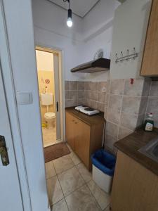 Kuchyň nebo kuchyňský kout v ubytování Niki's Rooms + 37 fotografií