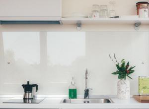 a kitchen counter with a sink and a window at Casa YUVI in Vetralla +40 photos
