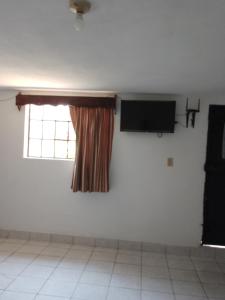 TV a/nebo společenská místnost v ubytování Cobán room + 20 fotografií