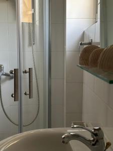 Kopalnica v nastanitvi Spacious apartment with top view