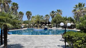 Басейн в Palma Village by Greek Pride Hotels або поблизу