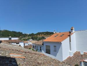 a view of the roofs of a town at Casamanuela in Aracena