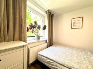 Krevet ili kreveti u jedinici u okviru objekta Pokoje przy plaży & PARKING +14 fotografija