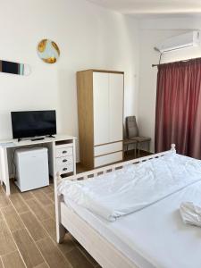 Postel nebo postele na pokoji v ubytování Vilele Delfin