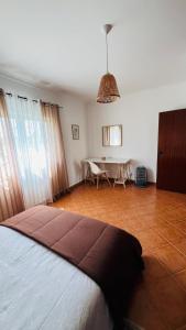 Ein Bett oder Betten in einem Zimmer der Unterkunft Quinta dos Moledros