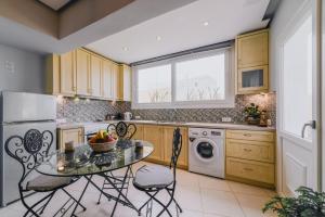 Kuchyňa alebo kuchynka v ubytovaní Aquarial Home