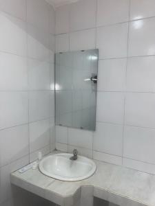 Ванная комната в Hotel Netral Jombang