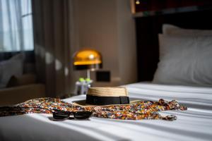 Postel nebo postele na pokoji v ubytování Fiori 41-By Adam Hotels