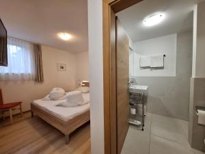 Kúpeľňa v ubytovaní Pension Sunnhofer