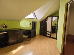 a bathroom with a vanity and a mirror in a attic at Mery Pery in Yerevan