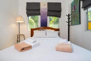 En eller flere senge i et værelse på Villa Prima - 3 Bedroom Private Pool Villa + 51 billeder