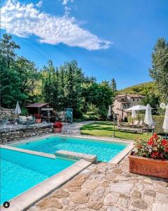 Bazén v ubytování Hotel Le Pozze Di Lecchi nebo v jeho okolí