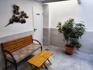 Posezení v ubytování Apartamentos De la Haya & Suite con Jacuzzi, junto al Teatro Romano