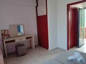Ένα ή περισσότερα κρεβάτια σε δωμάτιο στο Kavos Fantasia Complex