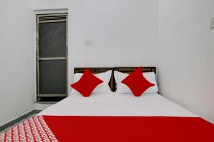 Postel nebo postele na pokoji v ubytování Hotel O R S Guest House