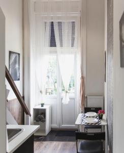 Μια τηλεόραση ή/και κέντρο ψυχαγωγίας στο Cozy Dowtown Lofts