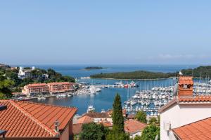 a view of a harbor with boats in the water at Studio Apartment Ana in Vrsar