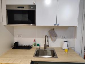 Кухня или мини-кухня в Apartmani Seka
